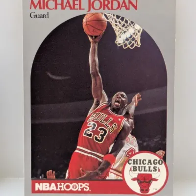 1989-90 NBA Hoops Michael Jordan #200 basketball trading card depicting him going up for a layup.