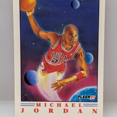1991 Fleer Michael Jordan basketball trading card #211, featuring outer space graphic art and in overall good condition.