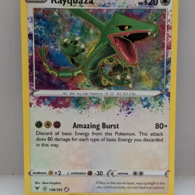 2020 Pokémon Sword & Shield Vivid Voltage Rayquaza Amazing Rare trading card (#138/185) in near-mint condition.