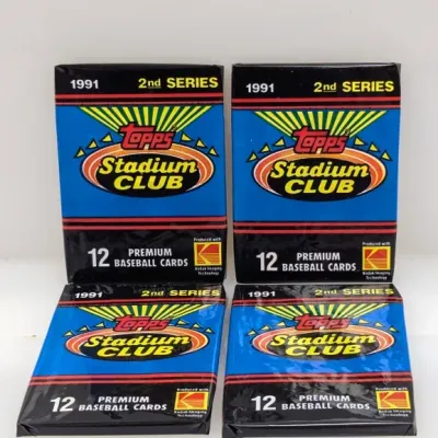 Four unopened wax packs of 1991 Topps Stadium Club 2nd Series premium baseball cards, each containing 12 cards.