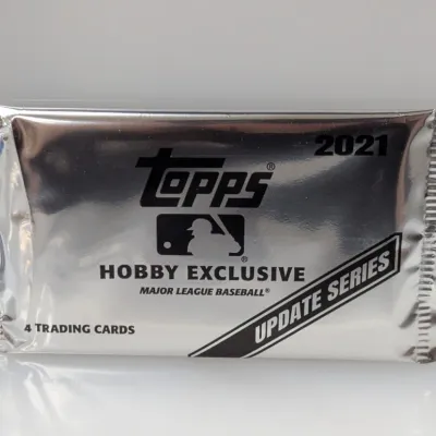 Sealed 2021 Topps MLB Update Series Hobby Exclusive silver pack containing four baseball trading cards.