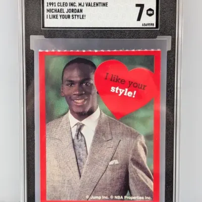 SGC-graded 7 NM copy of a 1991 Cleo Inc. Michael Jordan 'I Like Your Style!' Valentine trading card.