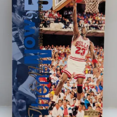 1995 Upper Deck 'Then & Now' Michael Jordan basketball card, featuring an action shot of Jordan dunking in his Chicago...
