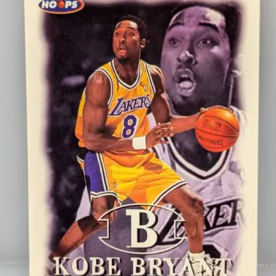 1997-98 NBA Hoops Kobe Bryant basketball card, #B10, featuring the Los Angeles Lakers guard in his iconic jersey.