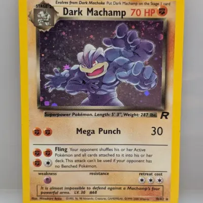 Dark Machamp holographic Pokémon card from the 2000 Team Rocket expansion set, number 10/82.