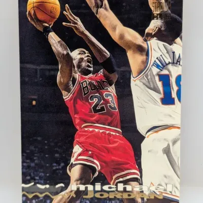 1993-94 Topps Stadium Club Michael Jordan #1 basketball trading card featuring an action shot against the New York Knicks.