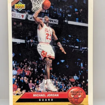 1992-93 Upper Deck Michael Jordan #23 basketball card featuring a photo of Jordan dunking.