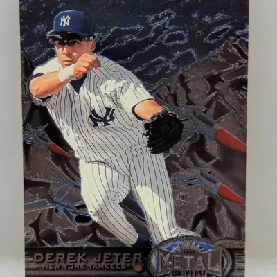 1997 Metal Universe Derek Jeter #53 baseball trading card featuring a metallic foiled background and high-action graphics.