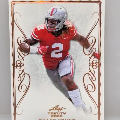 2020 Leaf Trinity Chase Young football trading card featuring his Ohio State Buckeyes uniform in good condition.