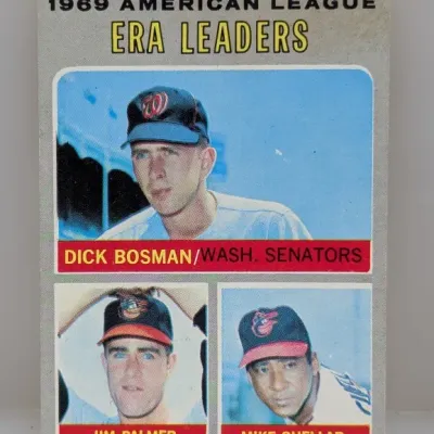 1970 Topps baseball card #61 featuring 1969 American League ERA Leaders Dick Bosman, Jim Palmer, and Mike Cuellar.