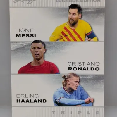 Leaf Exclusive Legends Edition triple soccer trading card featuring Lionel Messi, Cristiano Ronaldo, and Erling Haaland.
