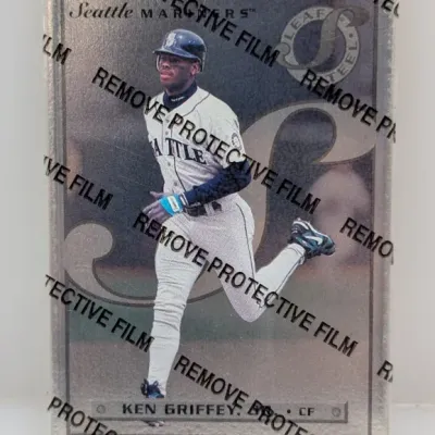 1996 Leaf Steel Ken Griffey Jr. baseball trading card, featuring its original peel-off protective film.