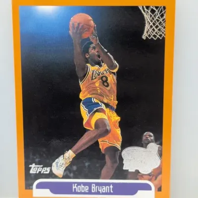 1996-97 Topps Kobe Bryant #138 rookie basketball trading card with NBA 50th Anniversary foil logo stamp.