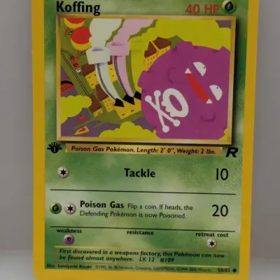1st Edition Team Rocket Koffing Pokémon trading card (#58/82), released by Wizards of the Coast in 2000.