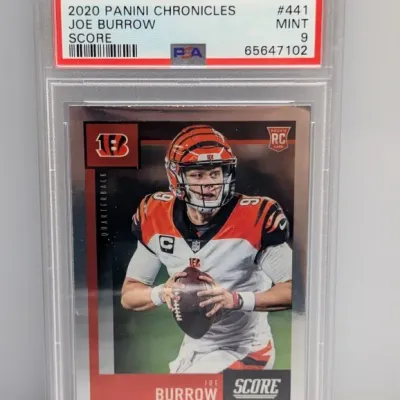 PSA-graded Mint 9 copy of a 2020 Panini Chronicles Joe Burrow Score rookie card, #441.