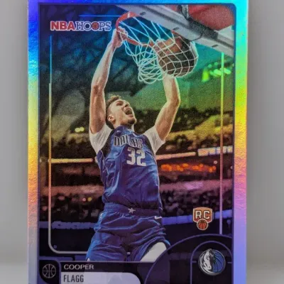 NBA Hoops Cooper Flagg rookie trading card featuring a holographic silver border finish.