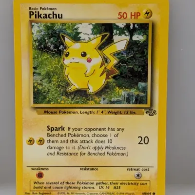 1999 Pokémon Jungle set Pikachu trading card, number 60/64, featuring artwork by Ken Sugimori.