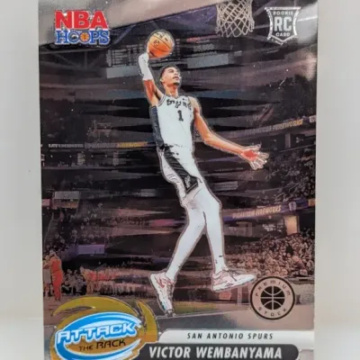 2023-24 Panini NBA Hoops Premium Stock Victor Wembanyama 'Attack the Rim' rookie card in crisp condition.