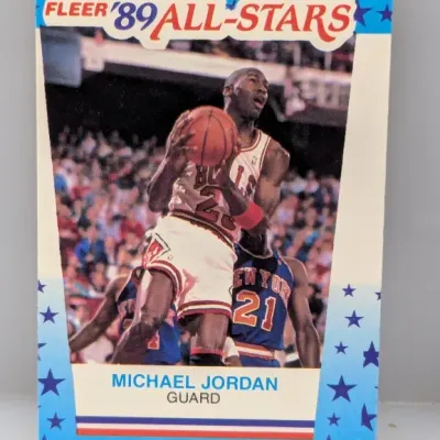 1989 Fleer All-Stars Michael Jordan #3 trading card, featuring a blue star border and action shot of Jordan in his Chicago Bulls uniform.