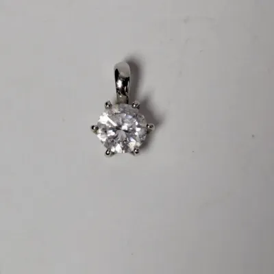 Single solitaire round brilliant-cut stone pendant set in a white gold or platinum six-prong basket mounting with a bail.