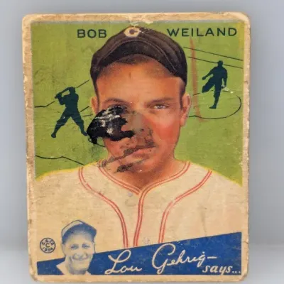 1934 Goudey #37 Bob Weiland baseball card featuring the 'Lou Gehrig says...' banner, showing significant wear, ink markings,...