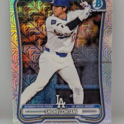 Bowman Chrome Shohei Ohtani trading card in a Los Angeles Dodgers uniform featuring a mojo refractor foil design.