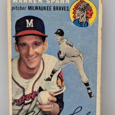 Vintage 1954 Topps Warren Spahn baseball card #148, Milwaukee Braves, showing light edge wear and rounded corners.