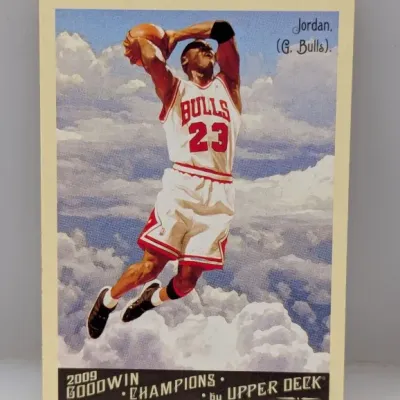 2009 Upper Deck Goodwin Champions Michael Jordan trading card featuring an painted illustration of him in his Chicago Bulls uniform.