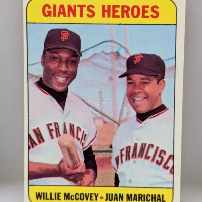 1970 Topps #161 "Giants Heroes" baseball card featuring Willie McCovey and Juan Marichal in good condition.