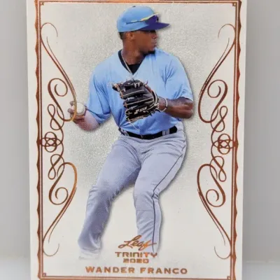 2020 Leaf Trinity Wander Franco trading card featuring metallic copper ornate border design.
