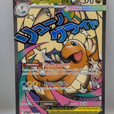 Mega Dragonite EX Pokémon trading card featuring full-art illustrations, star graphics, and Japanese text across the center.