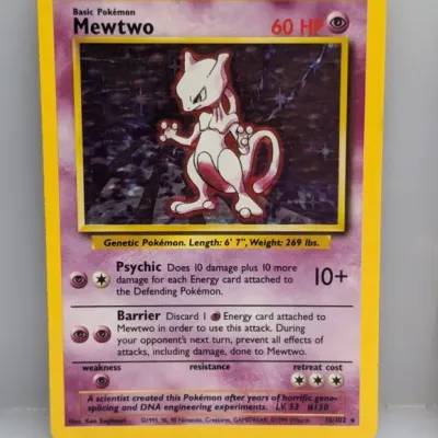 1999 Pokémon Base Set holographic Mewtwo trading card #10/102, featuring artwork by Ken Sugimori.