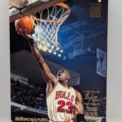 1992-93 Topps Stadium Club Michael Jordan 'Triple Double' basketball trading card (#210).
