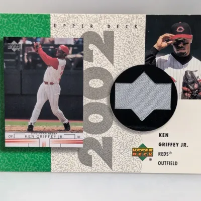 2002 Upper Deck Ken Griffey Jr. game-used jersey card featuring Cincinnati Reds graphics and a diamond-shaped jersey swatch relic.