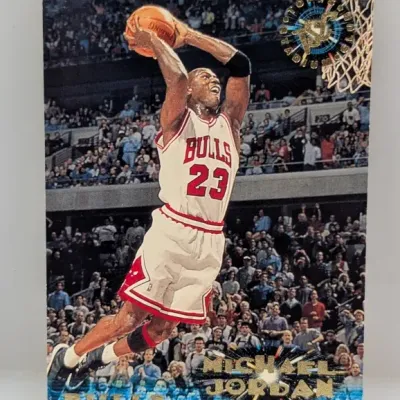 1997-98 Topps Stadium Club Michael Jordan #23 basketball card, featuring gold foil stamping and an in-action dunk shot.