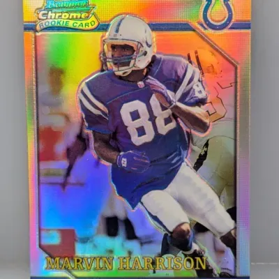 1996 Bowman Chrome Marvin Harrison rookie trading card featuring a vibrant refractor finish.