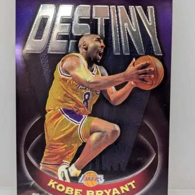 1997-98 Topps Chrome Destiny Kobe Bryant basketball insert trading card, featuring the Los Angeles Lakers star in his early career jersey.