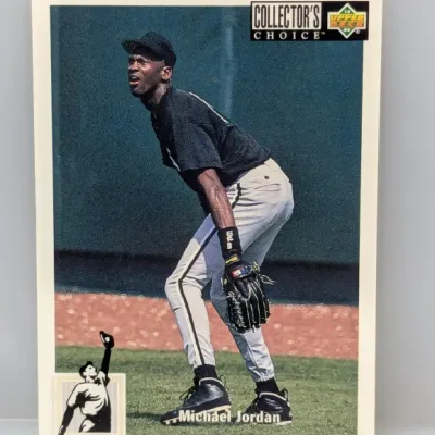 1994 Upper Deck Collector's Choice Michael Jordan baseball card showing him fielding in the outfield in a Birmingham Barons uniform.