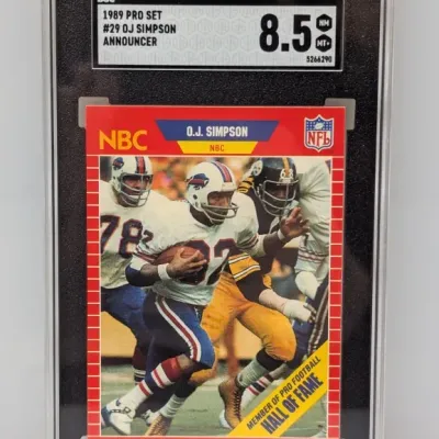 SGC-graded 8.5 NM/MT+ copy of a 1989 Pro Set #29 O.J. Simpson football trading card.