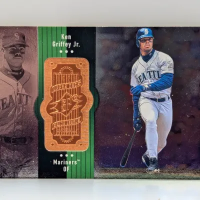 1997 Upper Deck SPx Ken Griffey Jr. Seattle Mariners baseball card featuring a copper die-cut insert.