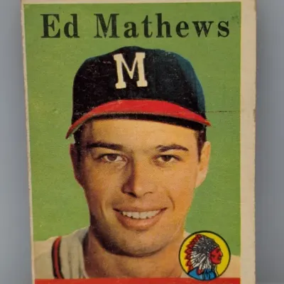 Vintage 1958 Topps Ed Mathews baseball card (#187), featuring the Milwaukee Braves third baseman with slight edge wear.