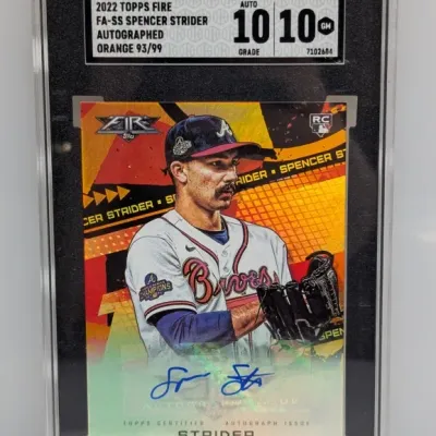 SGC 10 Gem Mint graded 2022 Topps Fire Spencer Strider autographed orange parallel rookie card, numbered 93/99.