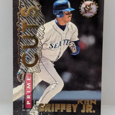 1990s Topps Stadium Club Prime Cuts Ken Griffey Jr. baseball trading card featuring gold foil lettering and textured accents.