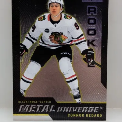 2023-24 Upper Deck SkyBox Metal Universe Connor Bedard rookie hockey card featuring the Chicago Blackhawks center in excellent condition.