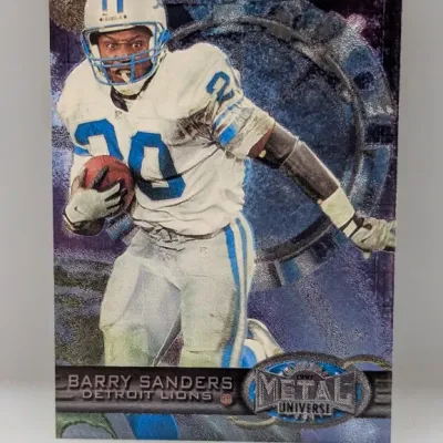 1997 Metal Universe Barry Sanders trading card featuring metallic foil background and embossed details.
