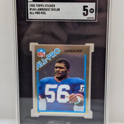 SGC-graded 5 EX copy of a 1982 Topps Sticker #144 Lawrence Taylor All-Pro Foil football card.