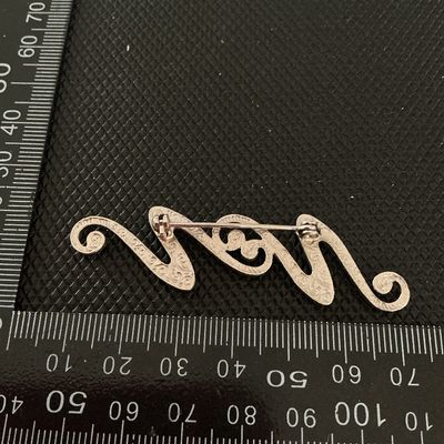 Silver-Tone Rhinestone Swirl Brooch Pin