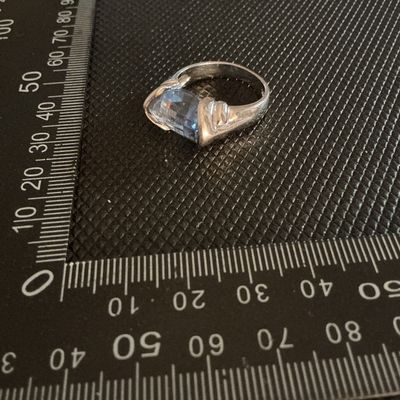 Silver-Tone Ring with Emerald-Cut Light Blue Stone