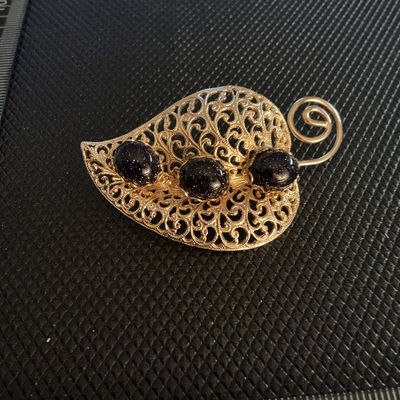 Vintage Gold Tone Filigree Leaf Brooch with Blue Goldstone Cabochons