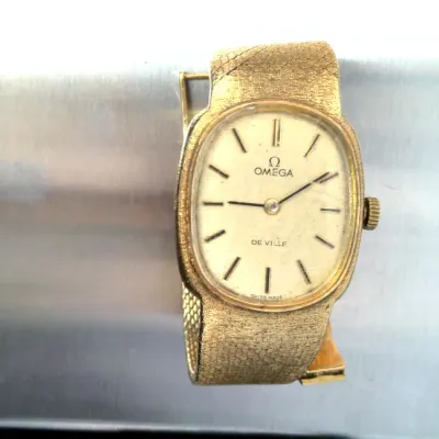 omega Women's watch 18K gold ***Be advised, there will be absolutely no Gold or Silver on display or on the property until the...